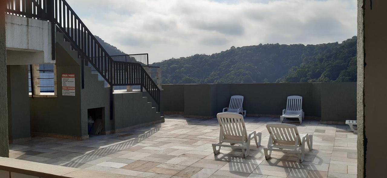 Apartment Guarujá: Beachside Retreat With Pool And Flexible Check-in Guaruja